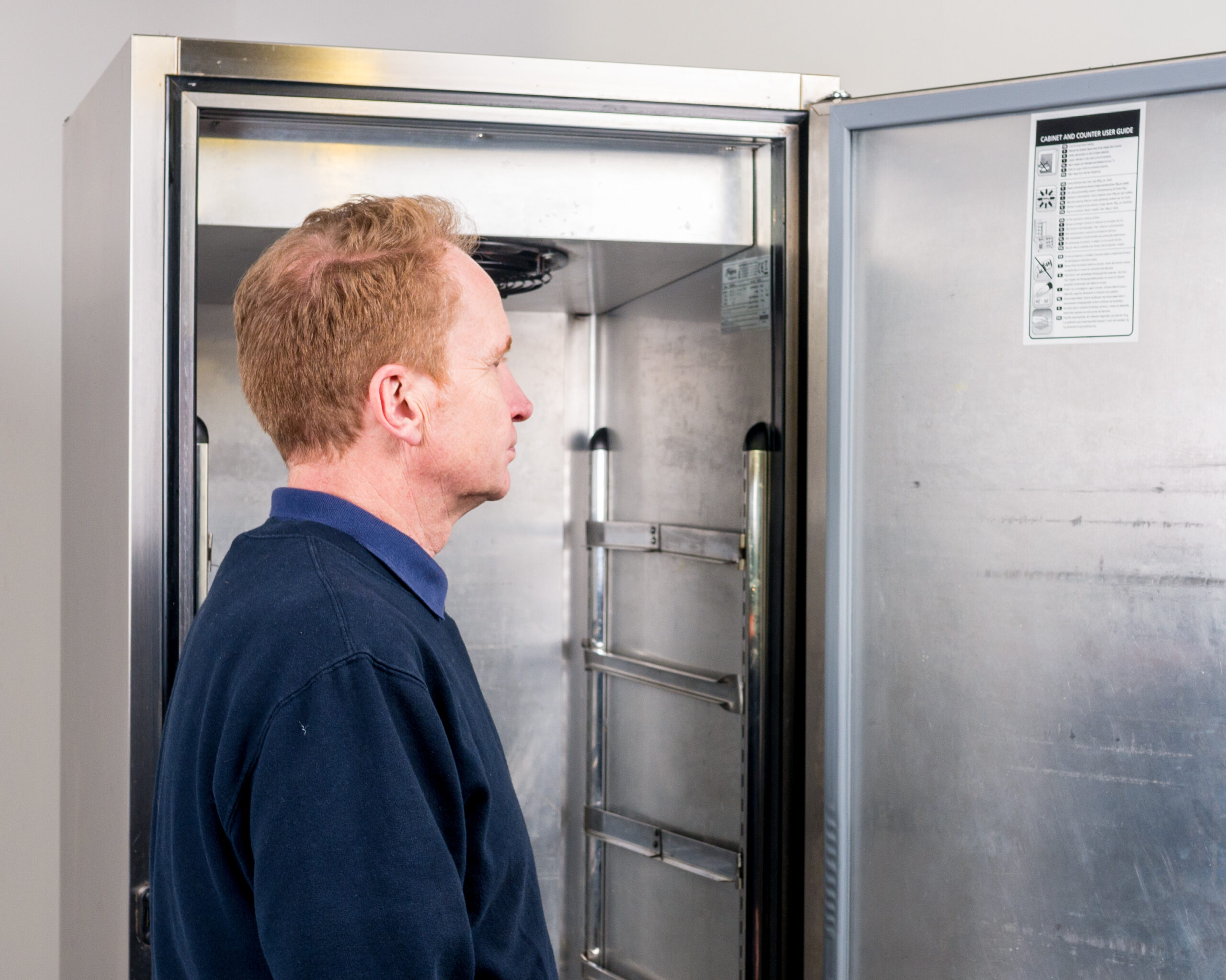 Checking fridge seals and fridge door alignment 