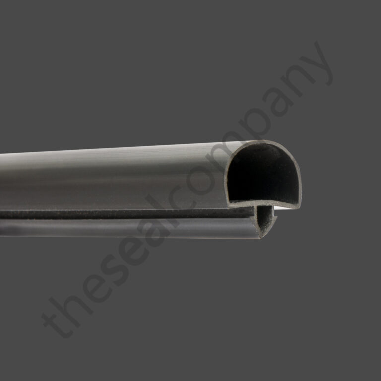 A close-up of the H&K International T03184 Door Gasket Seal, a dark grey rubber seal with a rounded top and channel underneath for edge fitting. The solid grey background features a faint diagonal “thesealcompany” watermark.